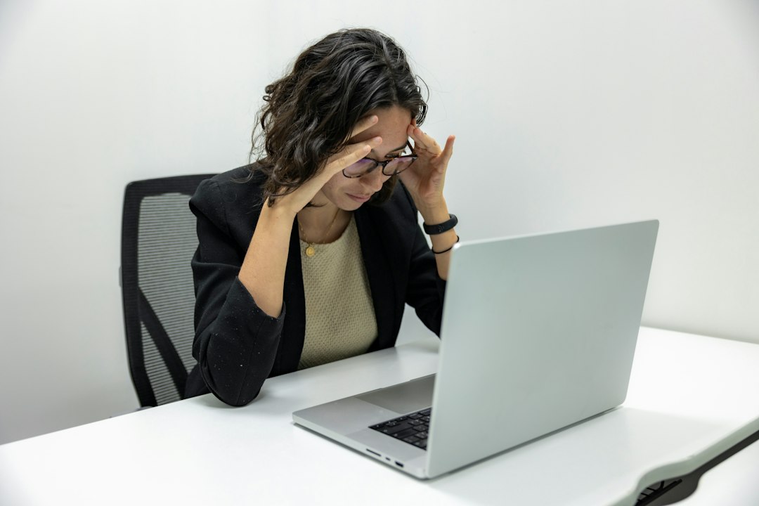 Nervous person feeling stressed while working at a computer